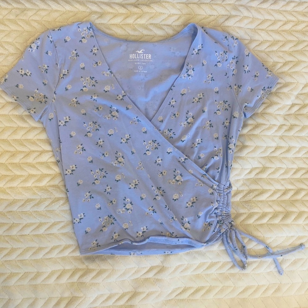 Baby blue shirt with flowers from holister. Size small for womens.